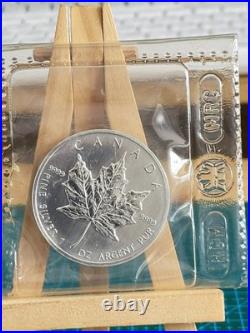 1990 1oz Canadian Maple Leaf Silver coin PERFECTLY RCM SEALED AND GENUINE (2)