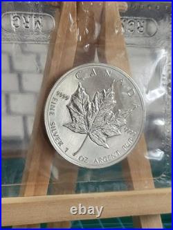 1990 1oz Canadian Maple Leaf Silver coin PERFECTLY RCM SEALED AND GENUINE (2)