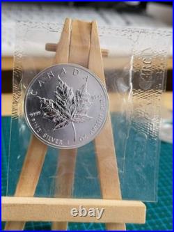 1990 1oz Canadian Maple Leaf Silver coin PERFECTLY RCM SEALED AND GENUINE (2)