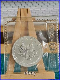1990 1oz Canadian Maple Leaf Silver coin PERFECTLY RCM SEALED AND GENUINE (2)