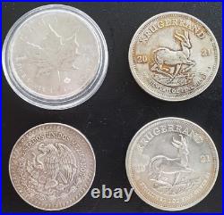 Lot of (4) Various One Ounce SILVER Coins Maple Leaf, Krugerrand, South Africa