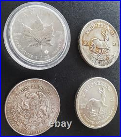 Lot of (4) Various One Ounce SILVER Coins Maple Leaf, Krugerrand, South Africa