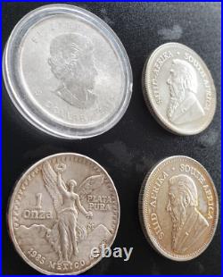 Lot of (4) Various One Ounce SILVER Coins Maple Leaf, Krugerrand, South Africa