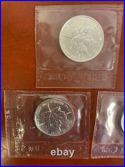 Lot of (5) 1991 Canadian Maple Leaf 1oz. 9999 Silver Coins in sealed Plastic