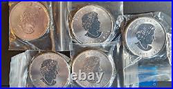 One 2014 and Four 2015 One Ounce Canadian Maple Leafs 5 Total Ounces. 999 KJS