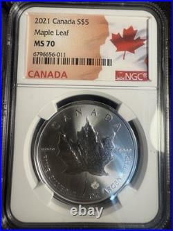 This Lot Is 2 Canadian Silver Maple Leaf Coins, And 1/2 gram Gold From Frontier This Lot Is 2 Canadian Silver Maple Leaf Coins, And 1/2 gram Gold From Frontier